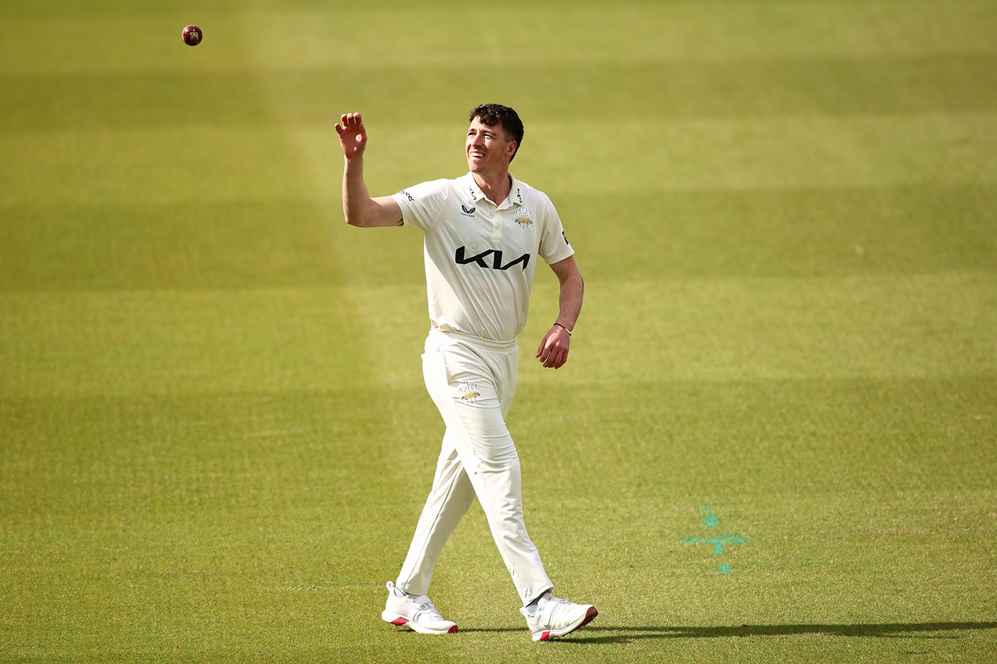 Fisher finishes with four as rain limits Surrey reply