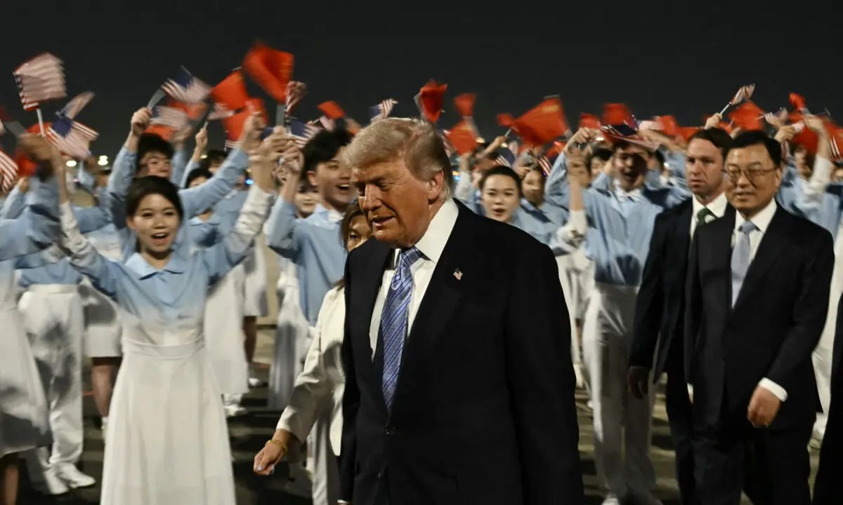 Trump arrives in Beijing for high-stakes meeting with Chinese President Xi