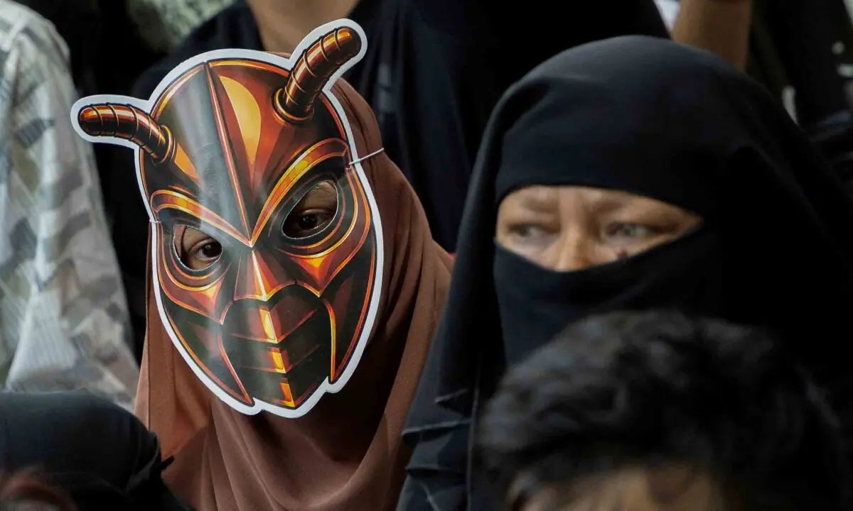 In pictures: 'Cockroaches' descend on New Delhi as party of social media fame stages protest