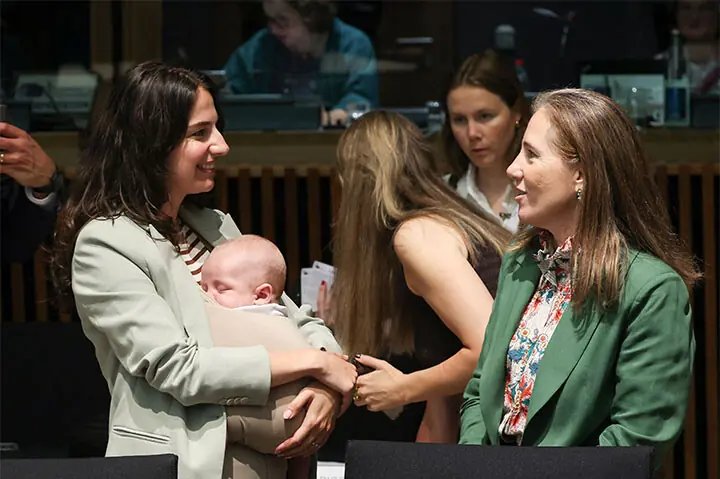 Swedish minister breaks ground by bringing baby to EU talks