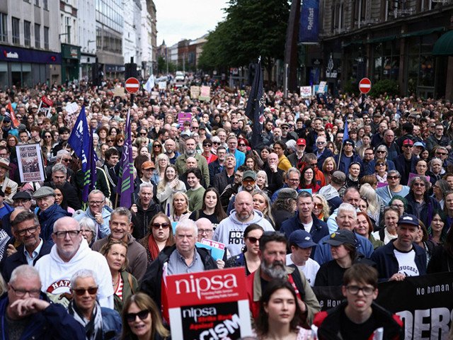 Thousands turn out for anti-racism rally after Belfast unrest