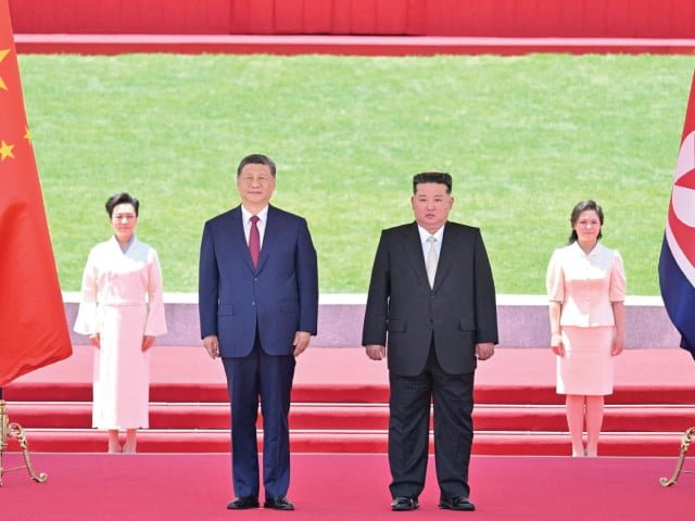 Xi vows unwavering support for Kim