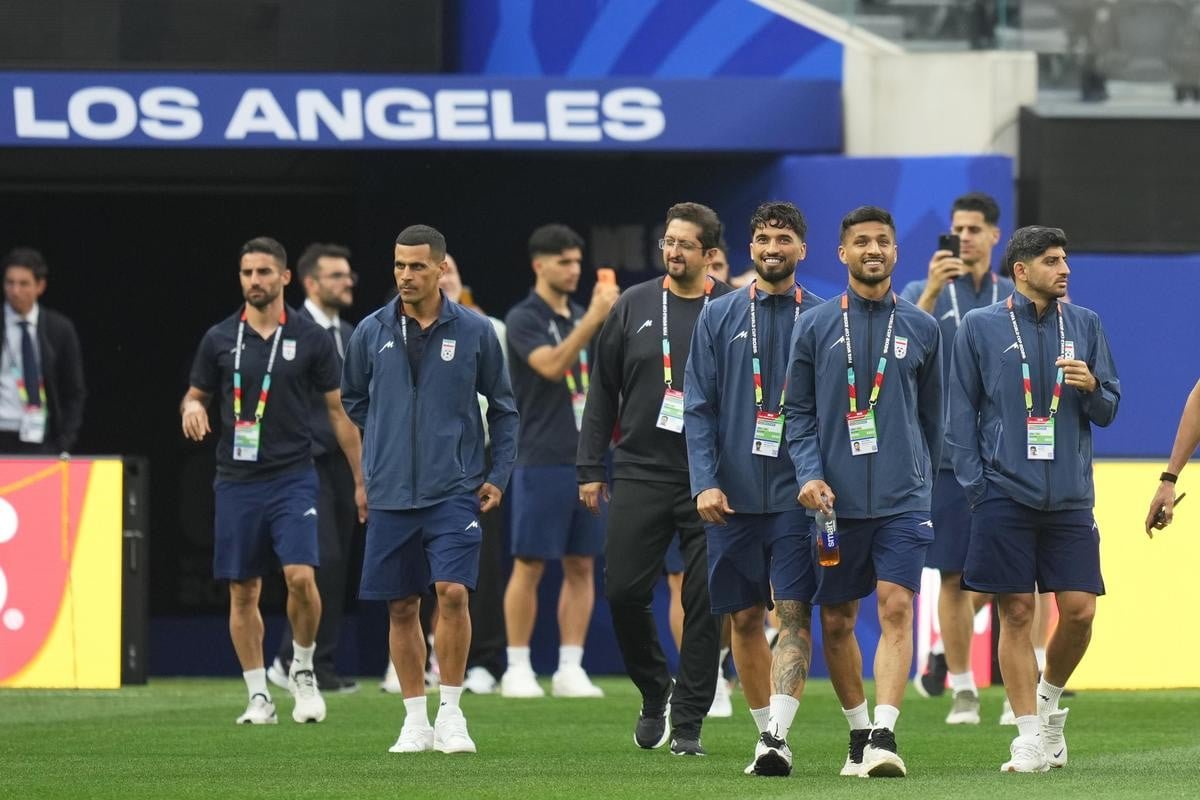 Iran team arrive in US for World Cup opener as the two nations reach peace deal