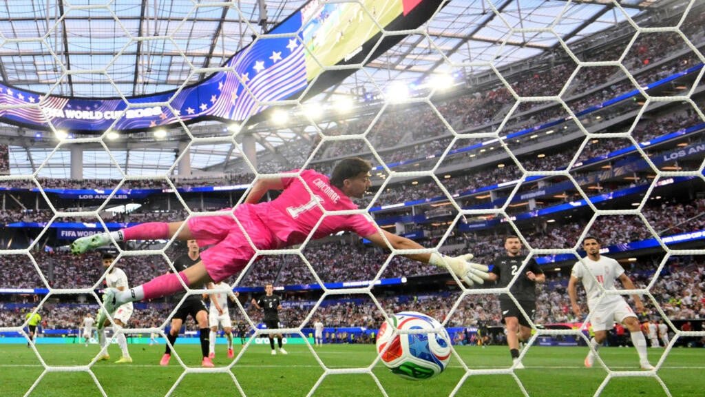 Iran snatch draw in World Cup opener
