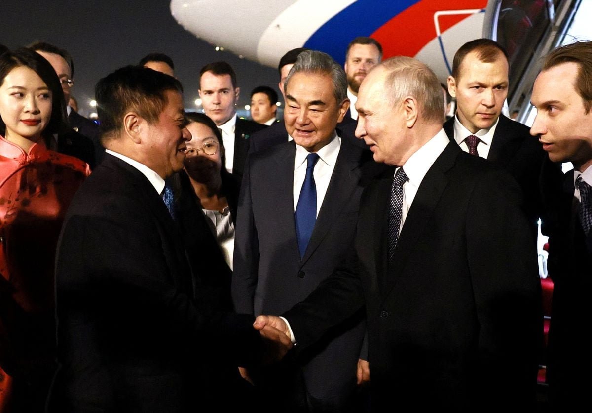 Putin lands in China for trip that aims to show unshakeable ties after Trump pomp